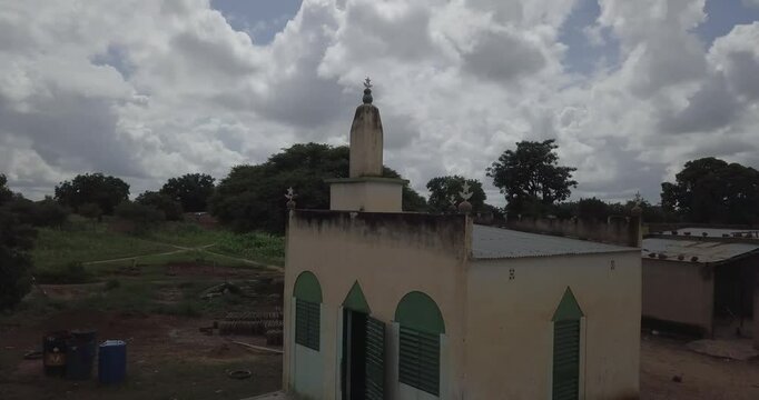 Daily life in a traditional village &ndash;  old earthen mosque in Burkina Faso, Africa