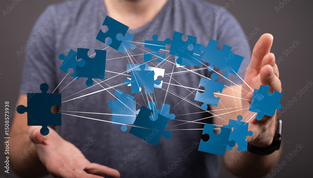 Aufkleber Image of hands holding interconnected puzzle pieces, symbolizing teamwork, collaboration, and problem-solving.