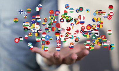 Image of hands holding diverse flags, symbolizing international connections and global...