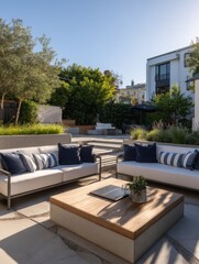 Modern outdoor seating area with a large fire table.