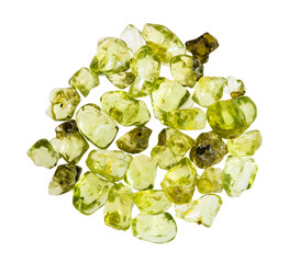 many polished peridot minerals isolated on white