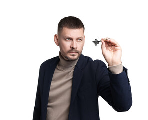 Targeting. Man with dart aiming on white background