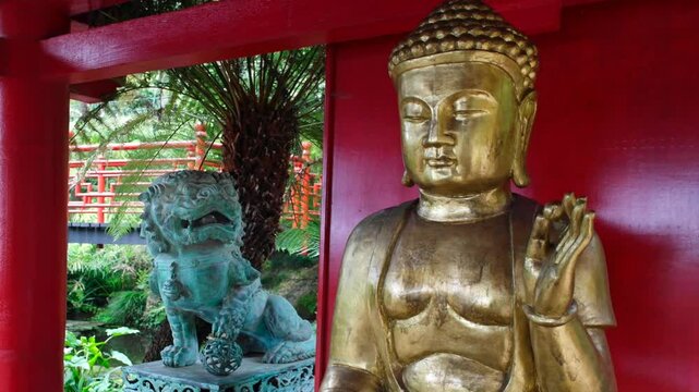 Antique Buddha statue in Japanese/ Chinese  Zen Garden