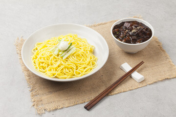  Ganjjajang is a Chinese dish. It is made by stir-frying with less water than jajangmyeon.