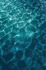 Obraz premium Water Surface Shimmers with Reflected Sunlight creating Intricate Patterns