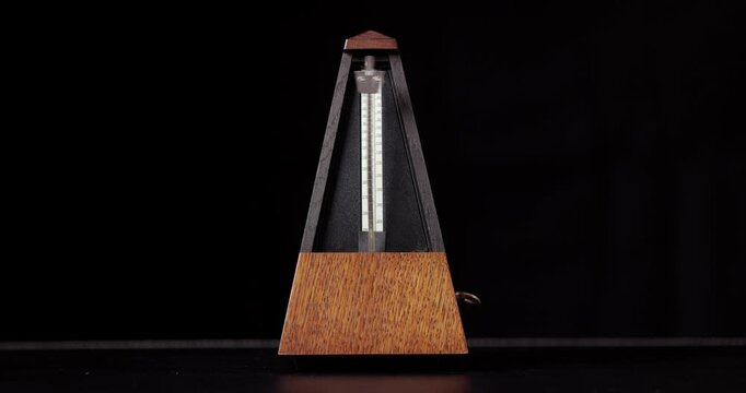 Metronome clicking on a table