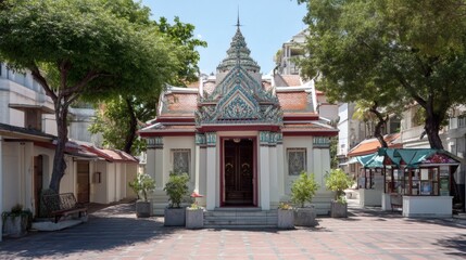 Traditional Thai Architecture in City Setting with Lush Greenery