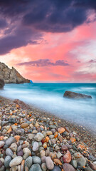 Amazing view of the beach and rocks shot with a long exposure.