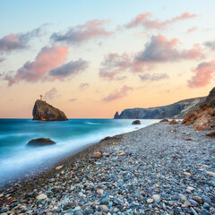 Amazing view of the beach and rocks shot with a long exposure.