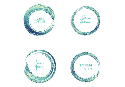 Set of four abstract watercolor circle frames with rough grunge brushstroke textures 
