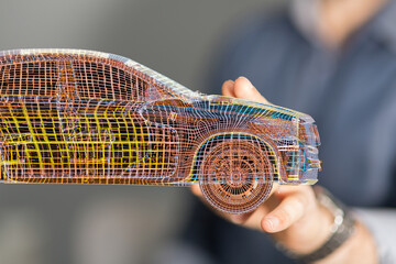 Innovative automotive design.  3D wireframe model of a car. Technology concept.