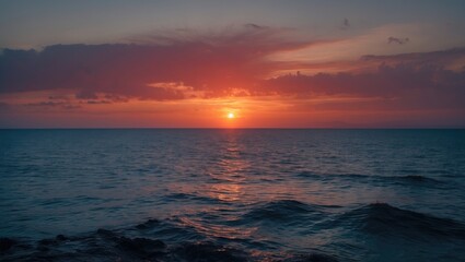 Obraz premium Scenic Sunset Over The Sea with vibrant colors and calm waves. Coastal landscape during twilight. Nature and tranquility at dusk.