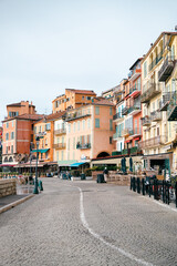 Colorful Waterfront Street with Restaurants and Balconies in a Mediterranean Town