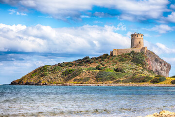 Fabulous view on Ancient Spanish tower of Coltellazzo of Saint Efisio lighthouse at Nora archeological site