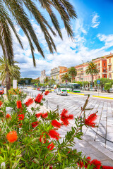 Street with typical architecture of the old center of Cagliari and Town Hall, Municipio di Cagliari.