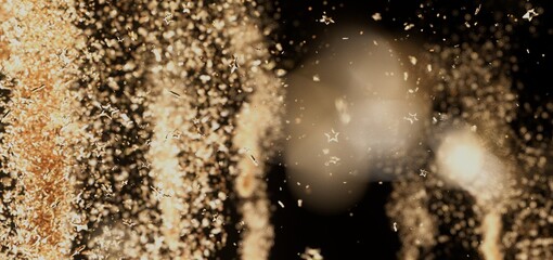 Abstract background image of shimmering gold particles and stars. Perfect for festive designs.