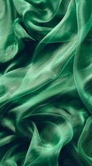 Fototapeta premium Elegant emerald green silk fabric with soft folds and luxurious texture, ideal for fashion or design projects