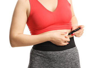 Woman injecting shot in the belly