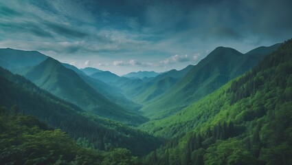 Naklejka premium A beautiful view of green mountains and forests under the blue sky