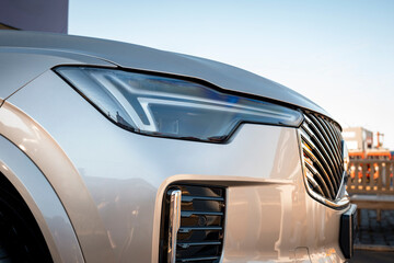 Front of a modern car with highlights including the sophisticated LED headlight design and the...