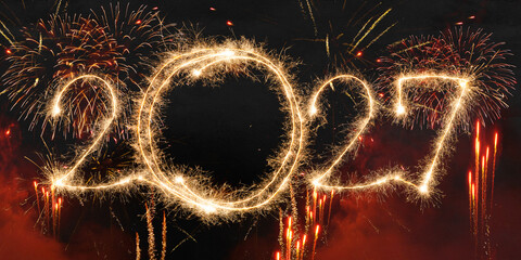 happy new year, new year's eve, silvester, new year, celebration greeting card, new year card - Year 2027 sparkler font text and firework fireworks pyrotechnic, isolated on black night sky background