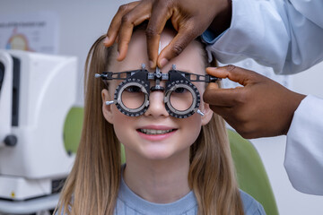 Close up of doctor adjusting optometric tool for vision check
