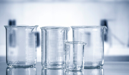 Laboratory Glassware with Test Tubes – Medical Office Background. Laboratory copy space for illustrating diagnostics, research, lab testing, or pharmaceutical themes.