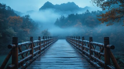 Fototapeta premium Misty mountain bridge, autumn colors, wooden planks