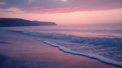 Peaceful sunset over a calm beach with soft waves and a pastel sky, creating a serene and tranquil atmosphere by the sea.