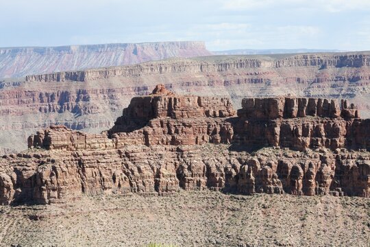 Breathtaking views of the Grand Canyon in Arizona, showcasing its rugged cliffs, colorful rock formations, and sweeping natural beauty.
