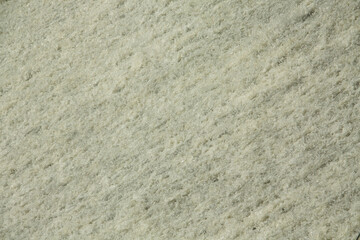 Detailed texture of downward flowing water, highlighting the rippling surface and soft shimmer.