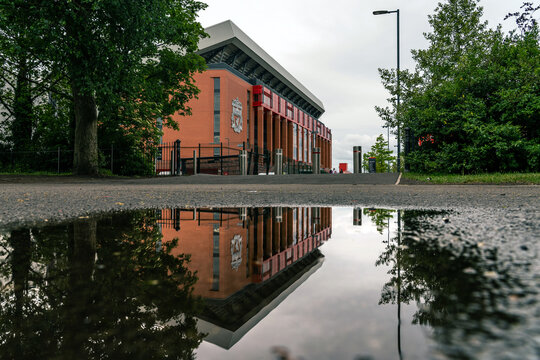 The Anfield Stadium in Liverpool, with its reflection