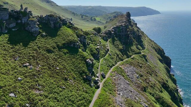 Drone landscape view of Valley of the rocks in Devon overlooking blue sea on a sunny day