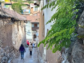 Panoramic views of the iconic cobblestone streets in the beautiful city of Cusco, Peru. A charming historic cityscape with colonial architecture, Inca heritage, and rich cultural atmosphere in the hea
