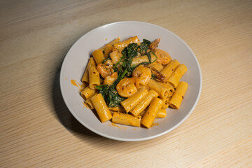 A plate of spicy prawn rigatoni pasta.
