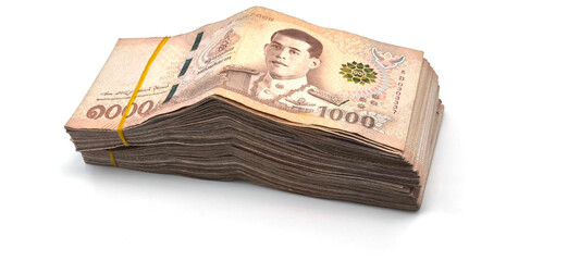 1.000 baht banknotes stacked on a white background. Finance and currency concept. Exchange rate.