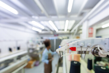 By using eco-friendly upgrades, an American female designer has made great strides in transforming the machinery that powers every sewing industry and textile mill. © Nutchapong Wuttisak