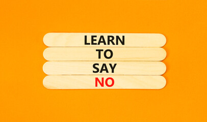 Learn to say no symbol. Concept words phrase Learn to say no on beautiful wooden stick. Beautiful...