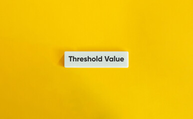 Threshold Value Phrase on Letter Tiles on Yellow Background – Minimalist Concept of Limits, Data Analysis and Decision Points