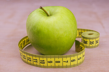 Eat healthy fruit loose weight Apple and tape measure