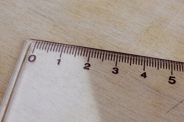 Ruler transparent decimal centimeters on a table