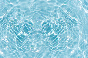 Blue water with ripples on the surface. Defocus blurred transparent blue colored clear calm water...