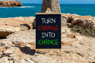 Turn change into chance symbol. Concept words phrase Turn change into chance on beautiful black...