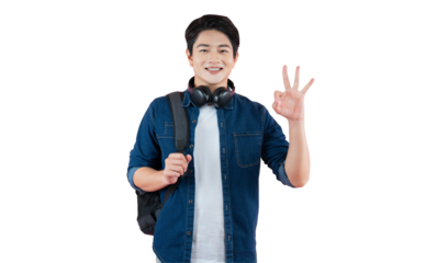 Student Demonstrating Optimism: A vibrant image showcasing a young student radiating optimism, his hand gracefully gesturing an okay sign. He stands with headphones, ready for new experiences.