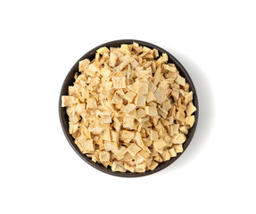 Dry parsley root, dried diced celery cubes, scattered small liquorice pileces, dry vegetable
