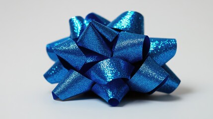 Blue gift bow close-up on white background