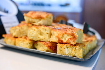 Bakery .Home made  cheese pie  with phyllo pastry, feta cheese  and organic eggs. Bulgarian banitsa. Brekfast on a display at Hotel