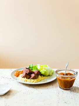 moose meat with chutney and bulgur