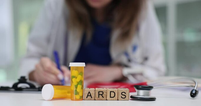 Female professional fills prescription for ARDS treatment near stethoscope medication bottles. Acute respiratory distress syndrome treatment in clinic
