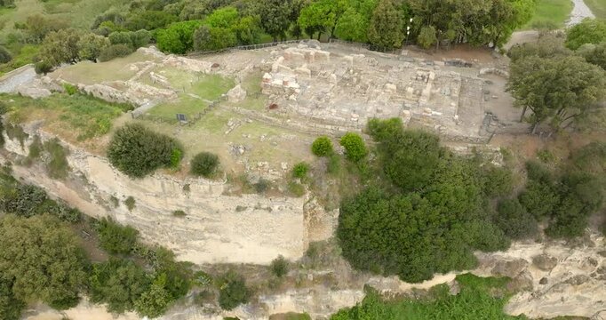 Aerial view of the Temple of Apollo in the archaeological excavations of Cumae, in the province of Naples, Campania, Italy. These are the remains of the ancient city of Cumae, an ancient Greek colony.